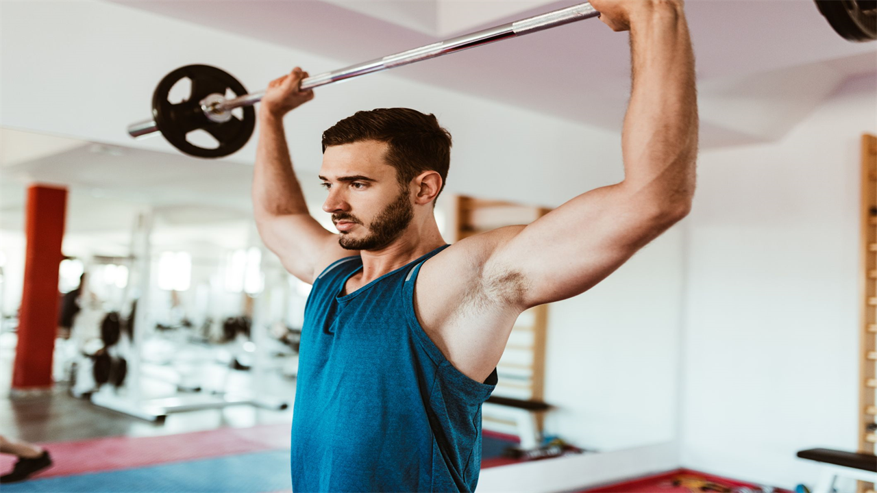 Stop Doing the Barbell Overhead Press. Do These Exercises to Build Your Shoulders Instead.